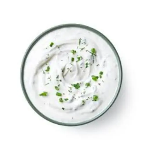 Sonic Bacon Ranch Queso Wrap – Cheesy Loaded Flavor 6 Creamy ranch dressing with a smooth, pale color, seasoned with herbs and spices, commonly used as a dip or salad dressing.